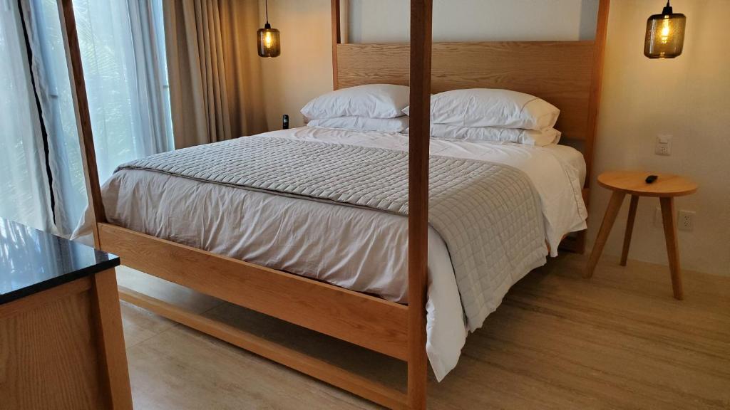 Postel nebo postele na pokoji v ubytování Hotel Secreto
