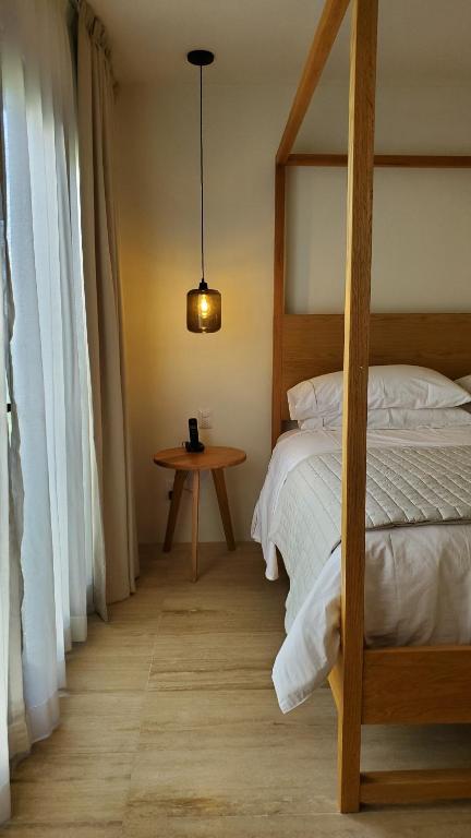 Postel nebo postele na pokoji v ubytování Hotel Secreto