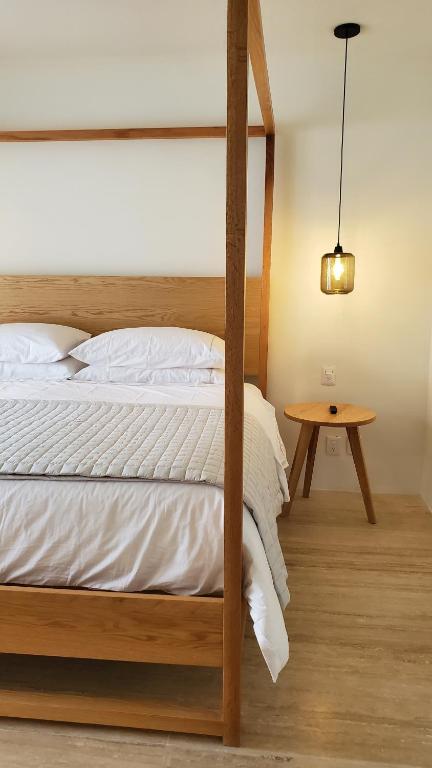 Postel nebo postele na pokoji v ubytování Hotel Secreto