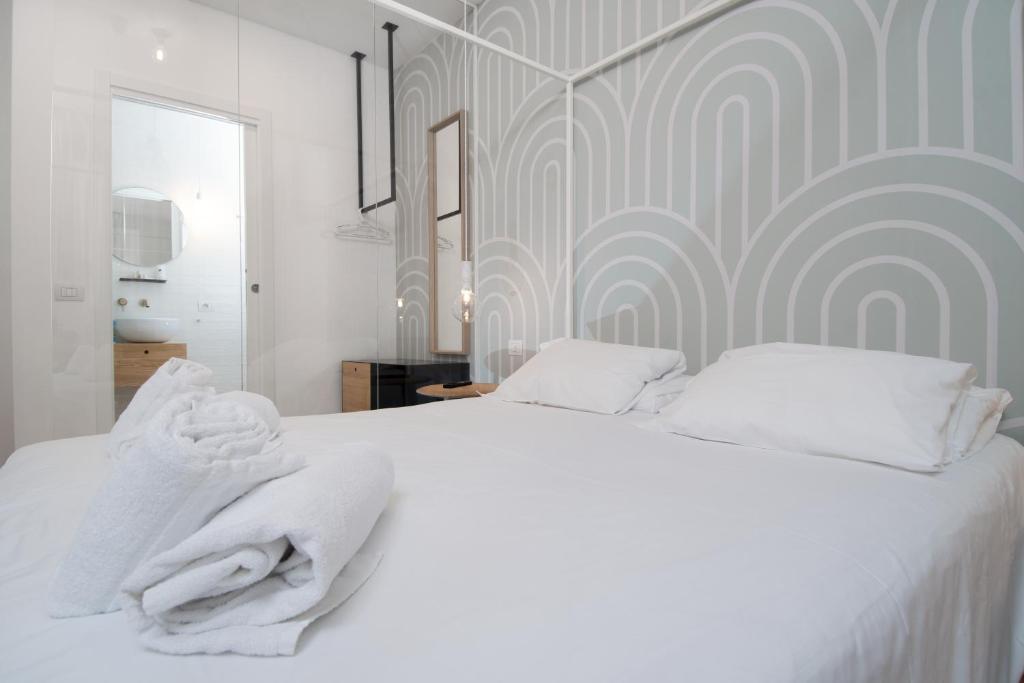 Postel nebo postele na pokoji v ubytování Hotel Rio