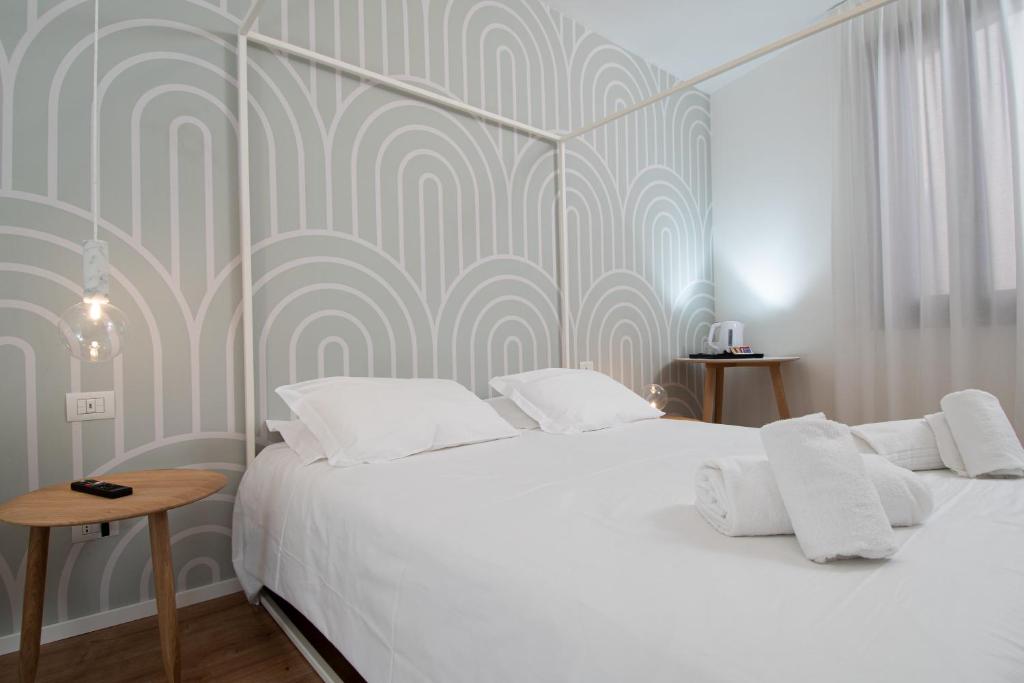 Postel nebo postele na pokoji v ubytování Hotel Rio