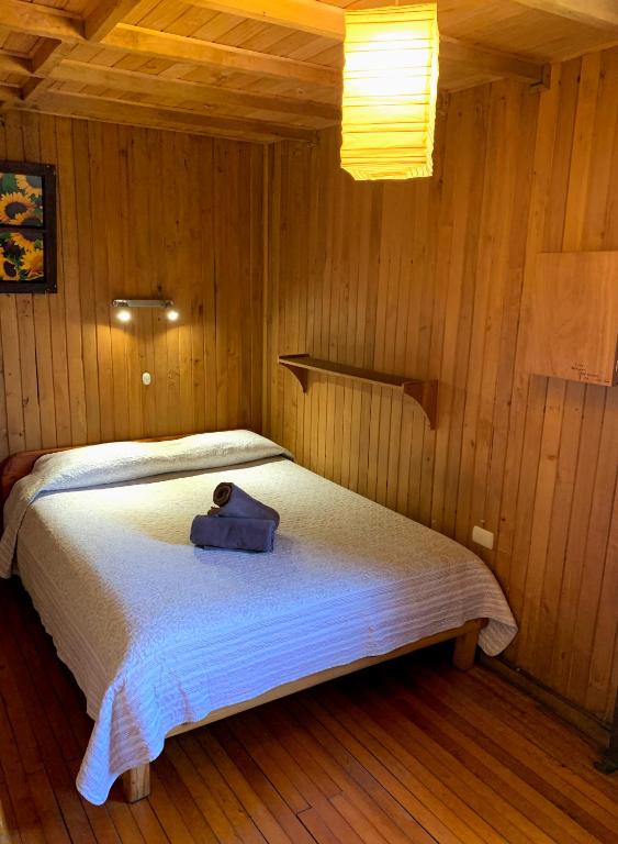 Postel nebo postele na pokoji v ubytování Casa Azul Hostel