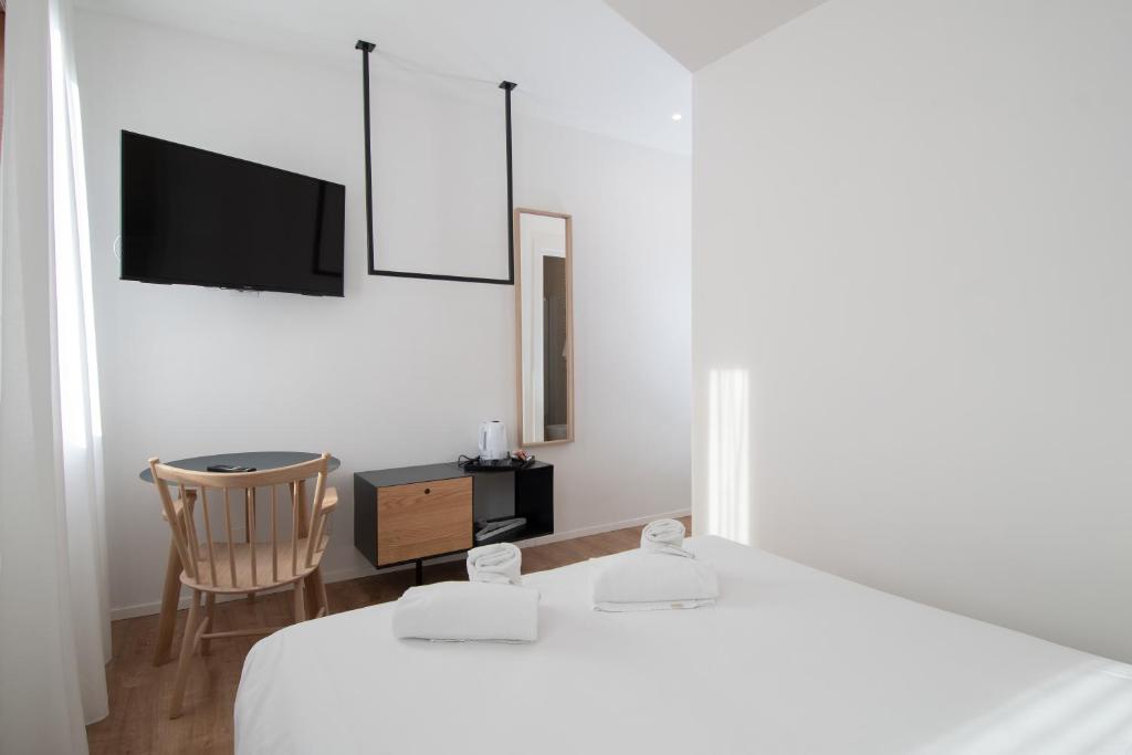 TV a/nebo společenská místnost v ubytování Hotel Rio
