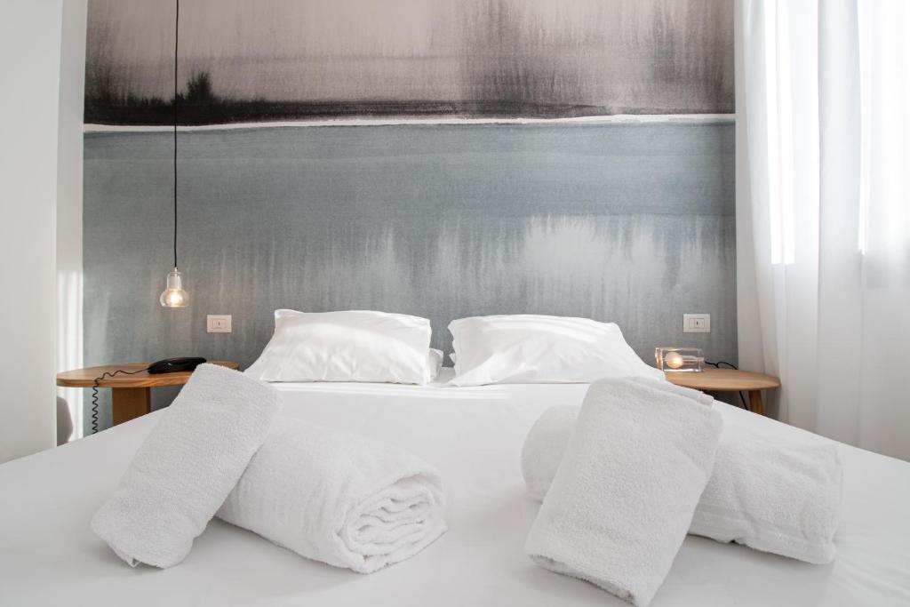 Postel nebo postele na pokoji v ubytování Hotel Rio