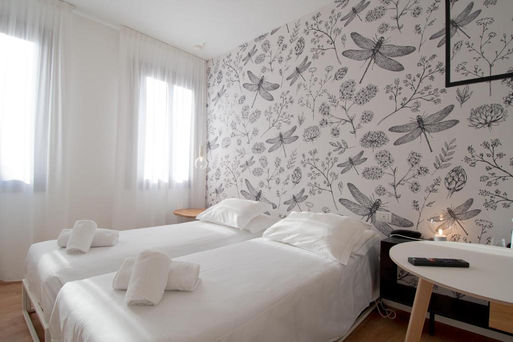 Postel nebo postele na pokoji v ubytování Hotel Rio