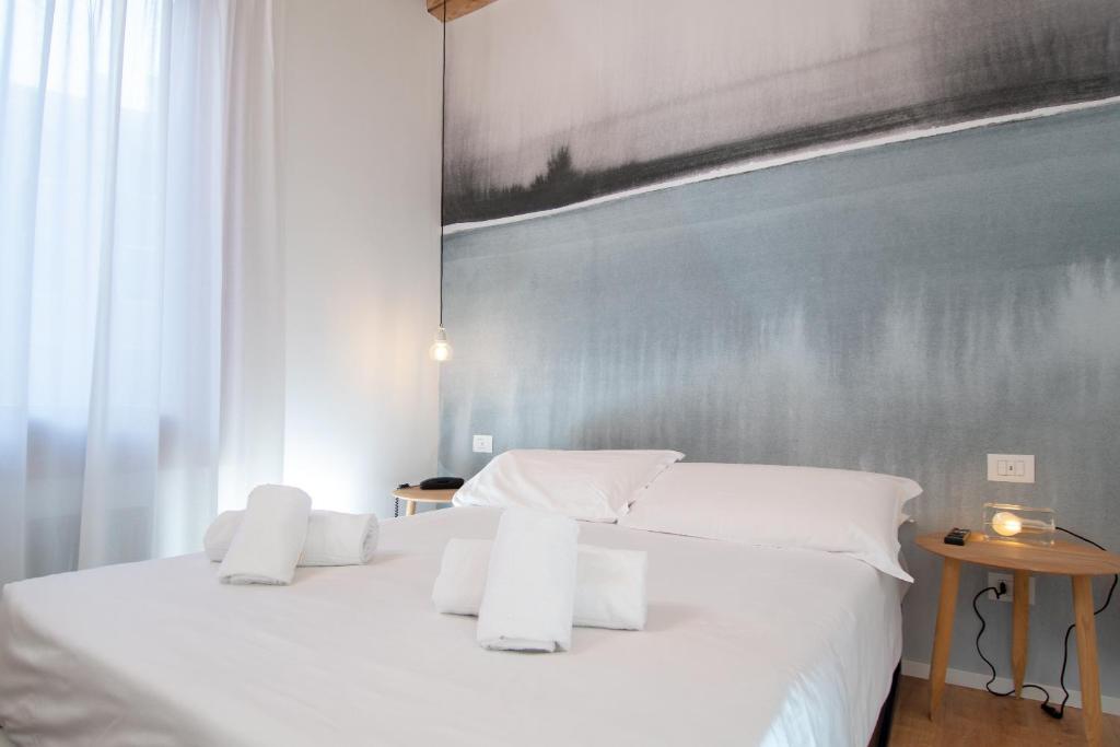 Postel nebo postele na pokoji v ubytování Hotel Rio