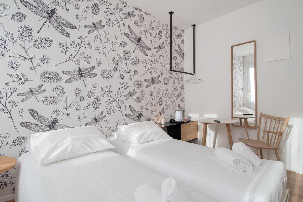 Postel nebo postele na pokoji v ubytování Hotel Rio