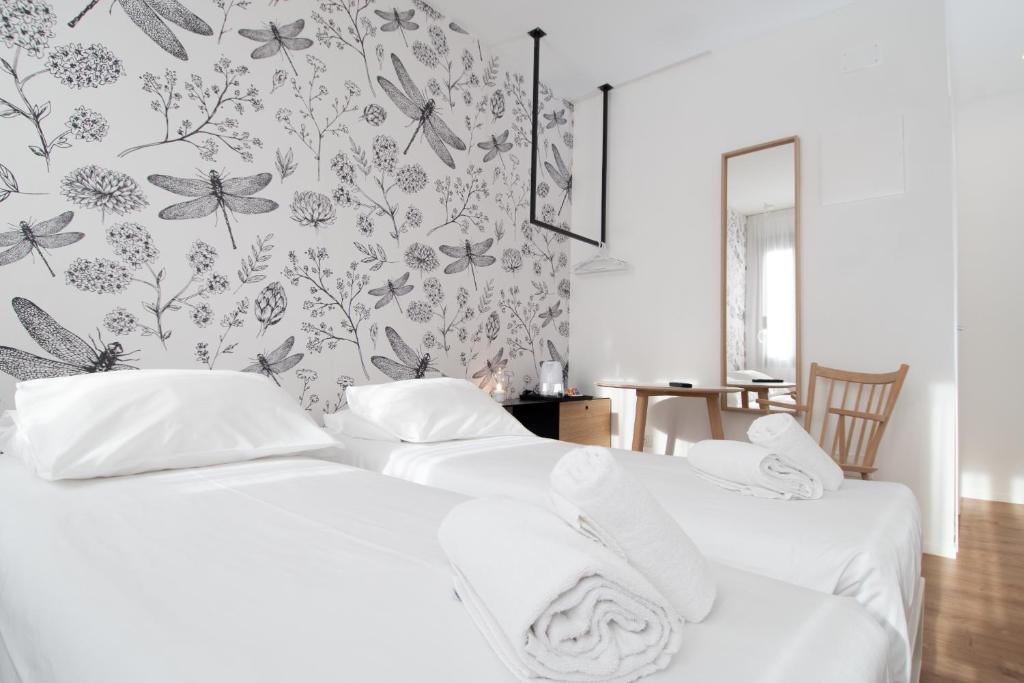 Postel nebo postele na pokoji v ubytování Hotel Rio