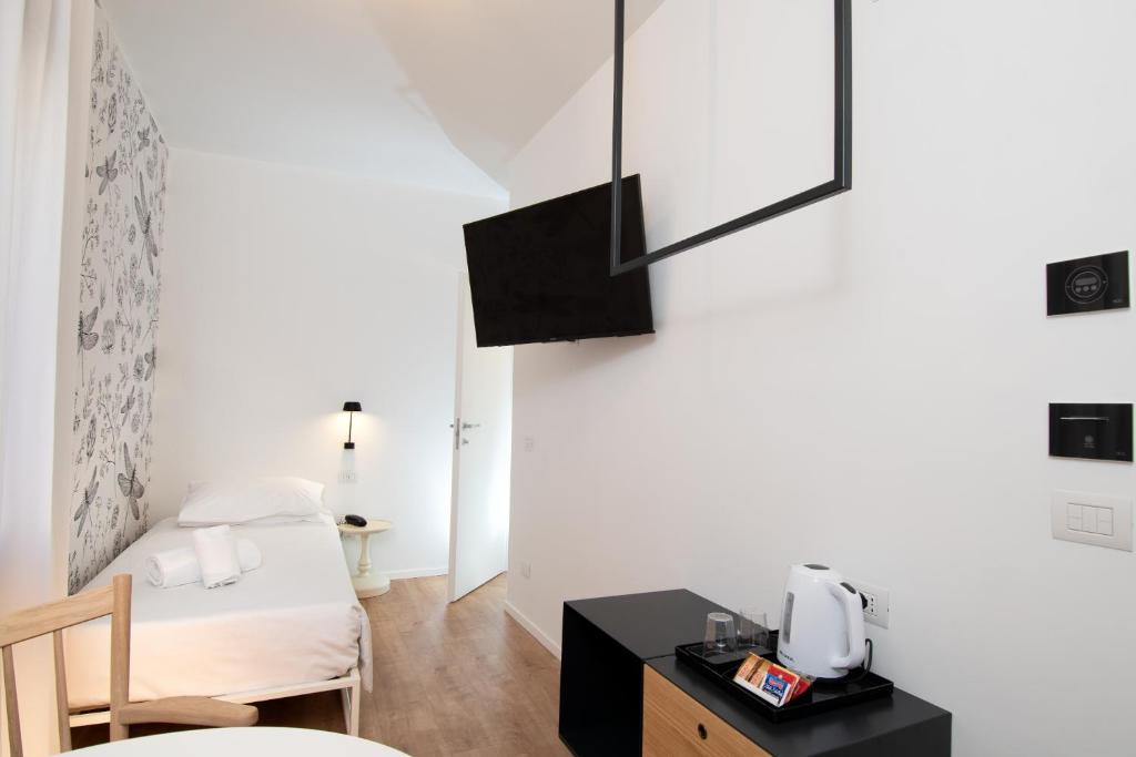 Postel nebo postele na pokoji v ubytování Hotel Rio