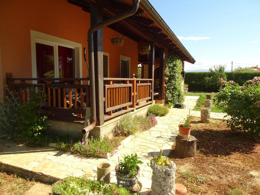 a porch of a house with plants on it at House Toni for 8 persons in Briševo