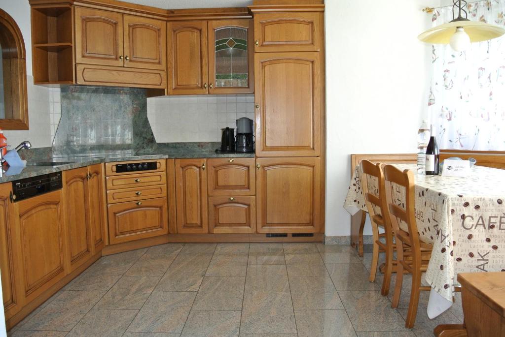 Kuchyň nebo kuchyňský kout v ubytování Apartment Aura