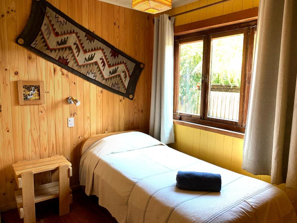 Postel nebo postele na pokoji v ubytování Casa Azul Hostel