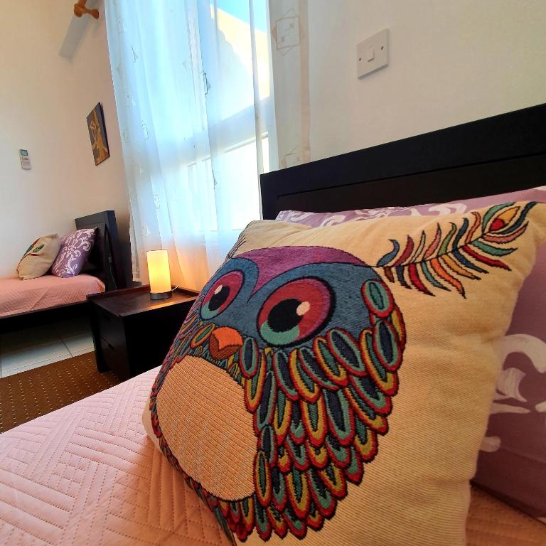 Postel nebo postele na pokoji v ubytování Owls Nest Townhouse