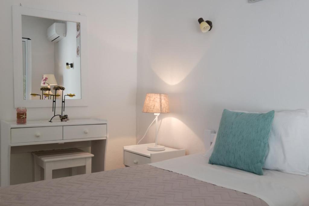 Voodi või voodid majutusasutuse Eftyxia apartments toas