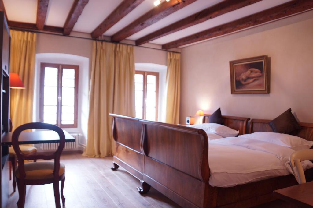 Postel nebo postele na pokoji v ubytování Maison Junod