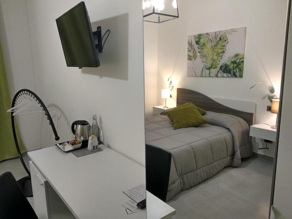 Televízia a/alebo spoločenská miestnosť v ubytovaní B&B Giovaldi's Torino