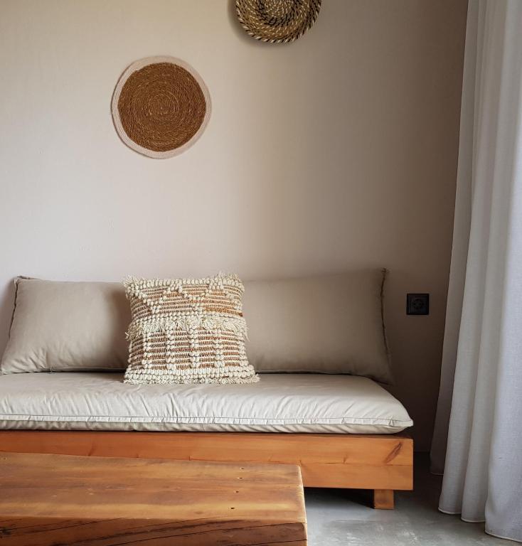 Łóżko lub łóżka w pokoju w obiekcie Mira Living Concept Suites Adults Only