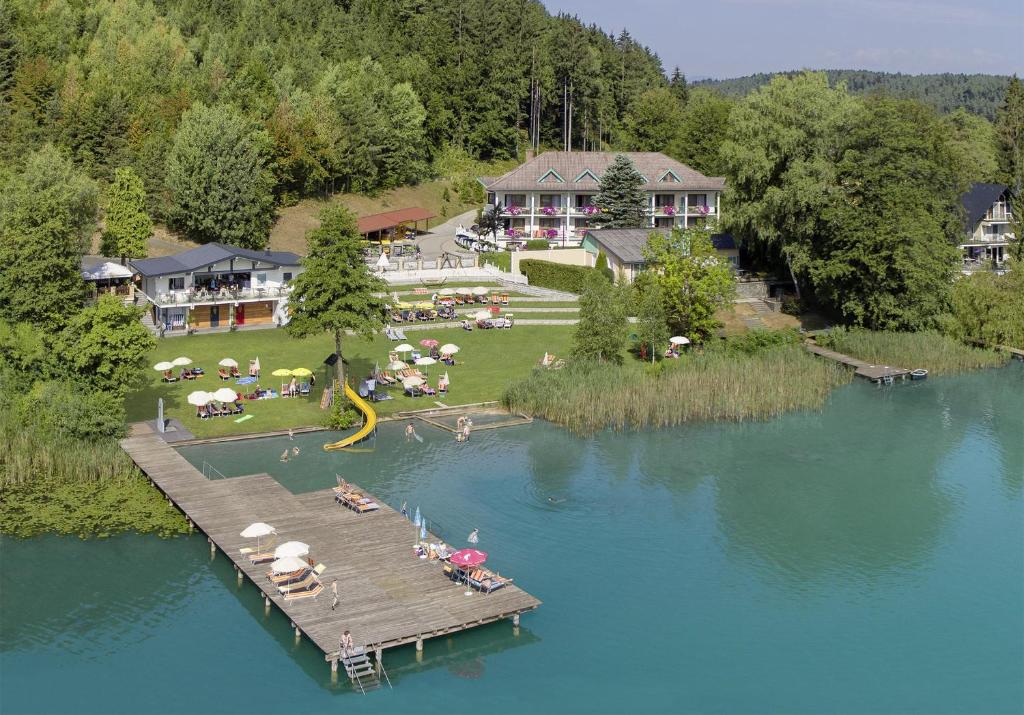 an aerial view of a resort with people on a dock at Seehotel Princes in Sankt Kanzian