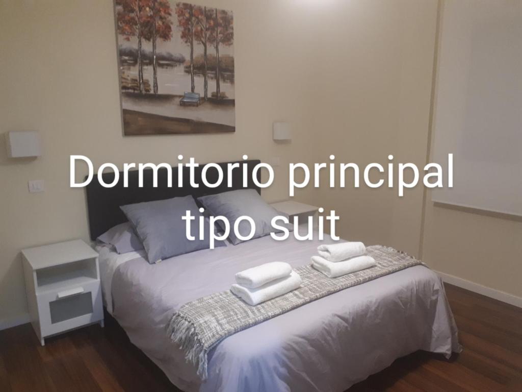 Postel nebo postele na pokoji v ubytování Casa ManPer playa, Alcaravaneras, 3 dormitorios