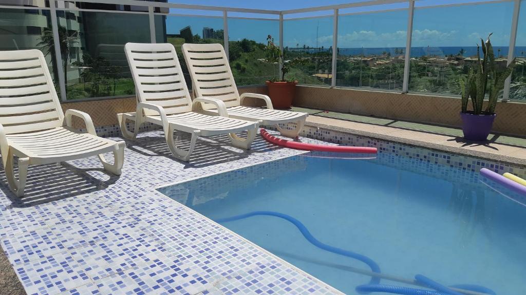  Lindo quarto e sala vista mar e piscina