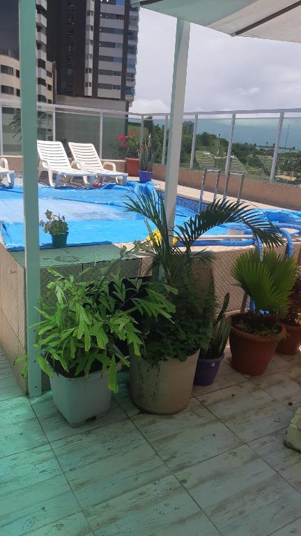  Lindo quarto e sala vista mar e piscina