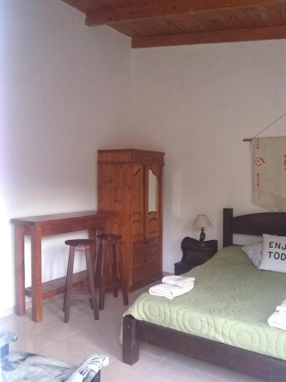 Postel nebo postele na pokoji v ubytování La Vilma Hospedaje Familiar