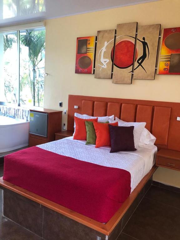 Postel nebo postele na pokoji v ubytování ATENEA SPA Hotel