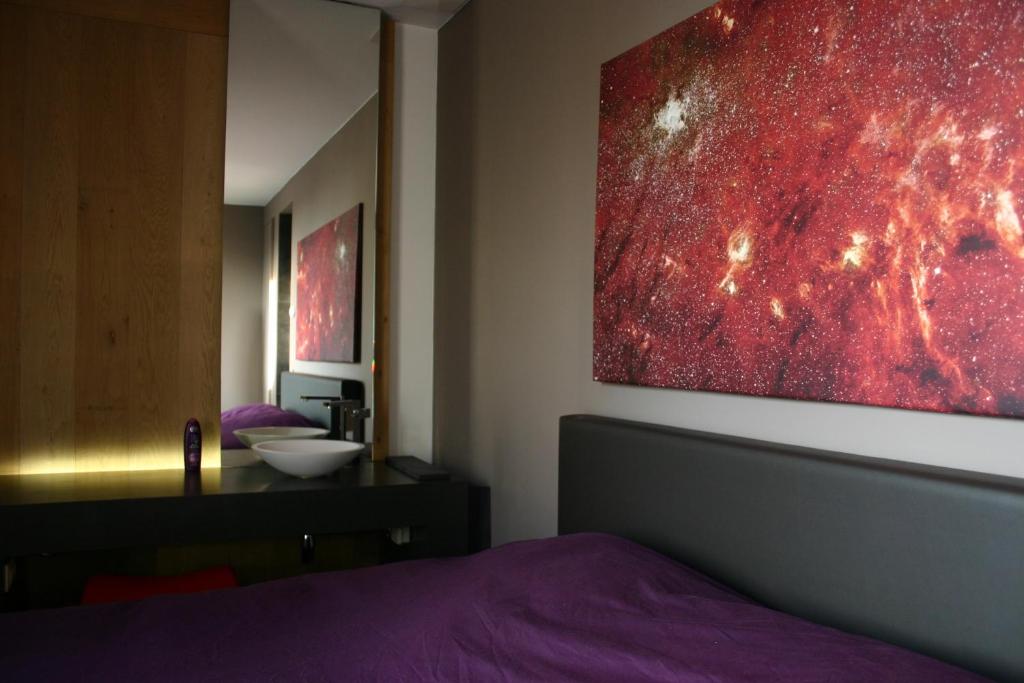 Postel nebo postele na pokoji v ubytování Loft Aan Het Water