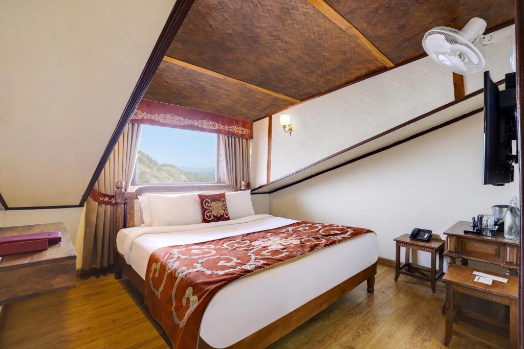 Postel nebo postele na pokoji v ubytování Summit Hermon Hotel & Spa