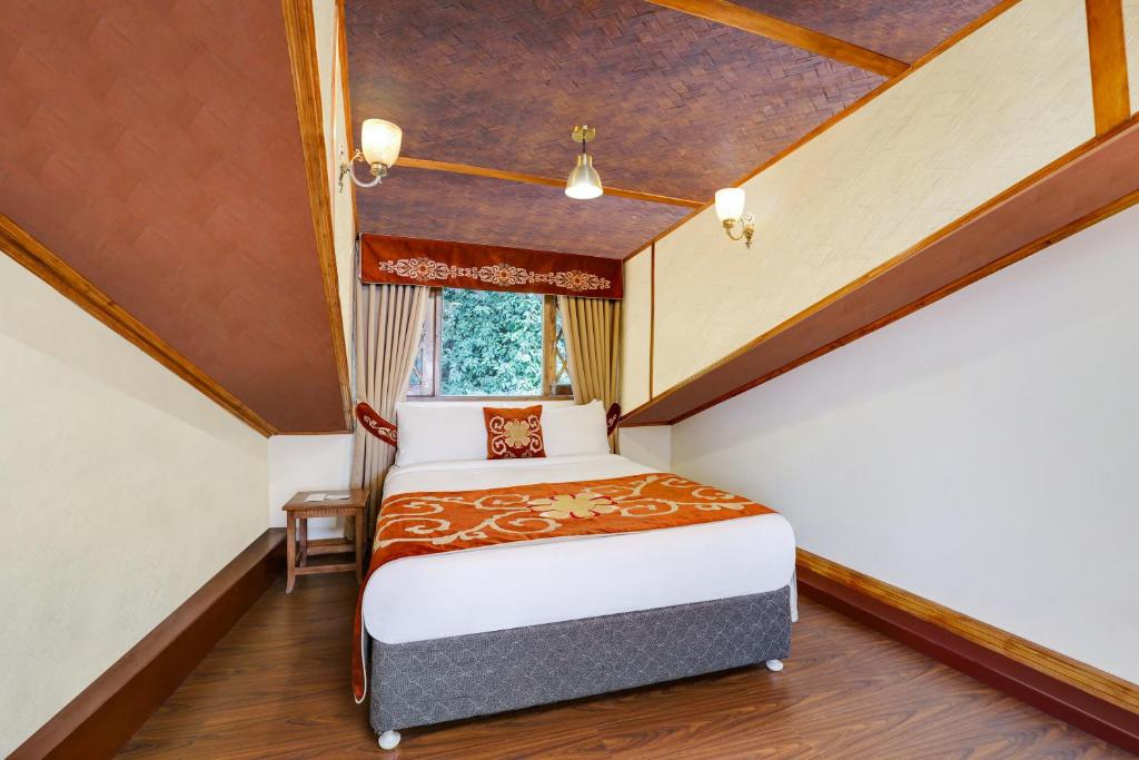 Postel nebo postele na pokoji v ubytování Summit Hermon Hotel & Spa