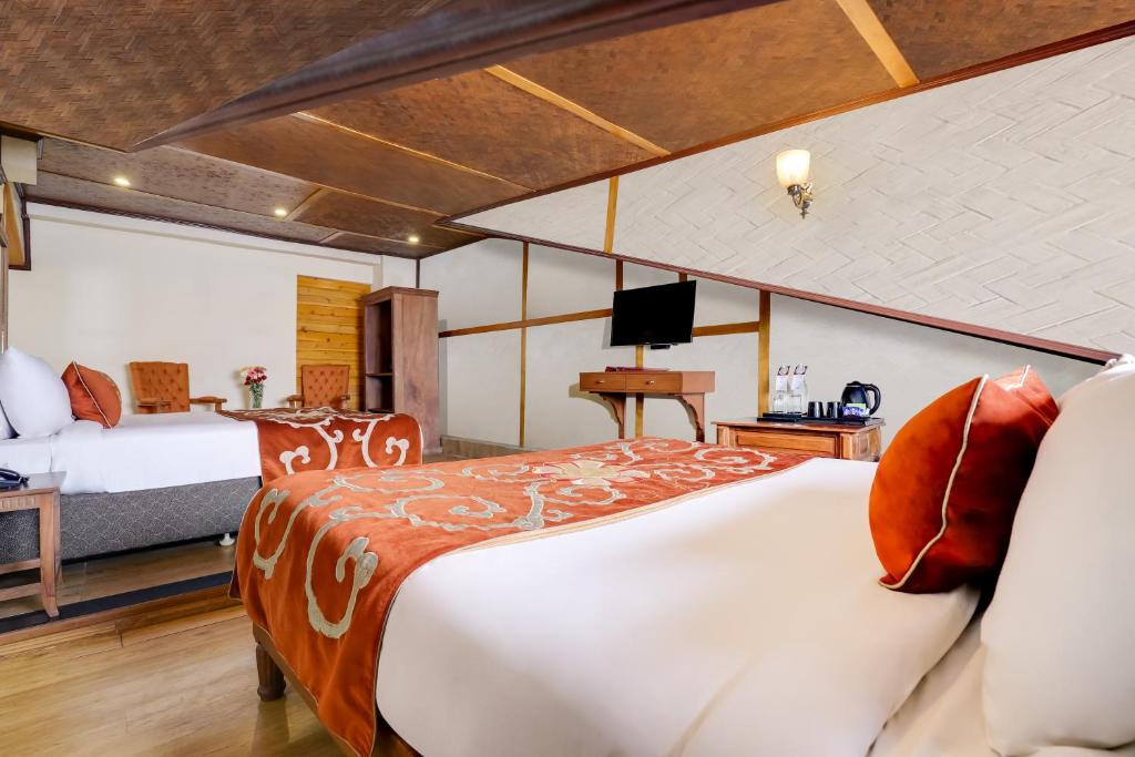 Postel nebo postele na pokoji v ubytování Summit Hermon Hotel & Spa