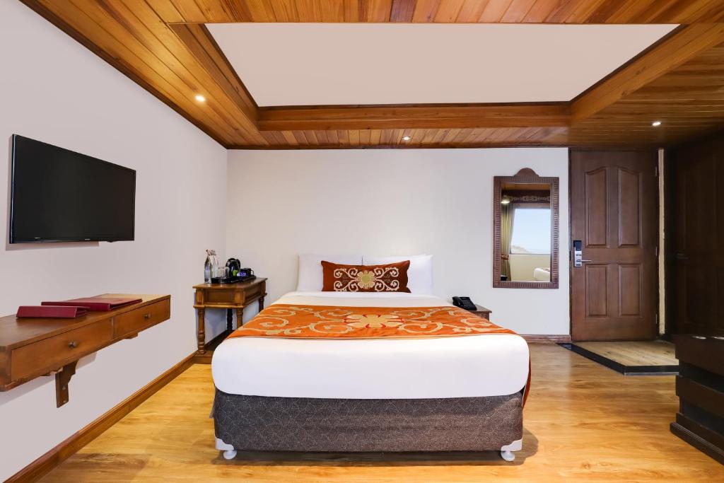 Postel nebo postele na pokoji v ubytování Summit Hermon Hotel & Spa