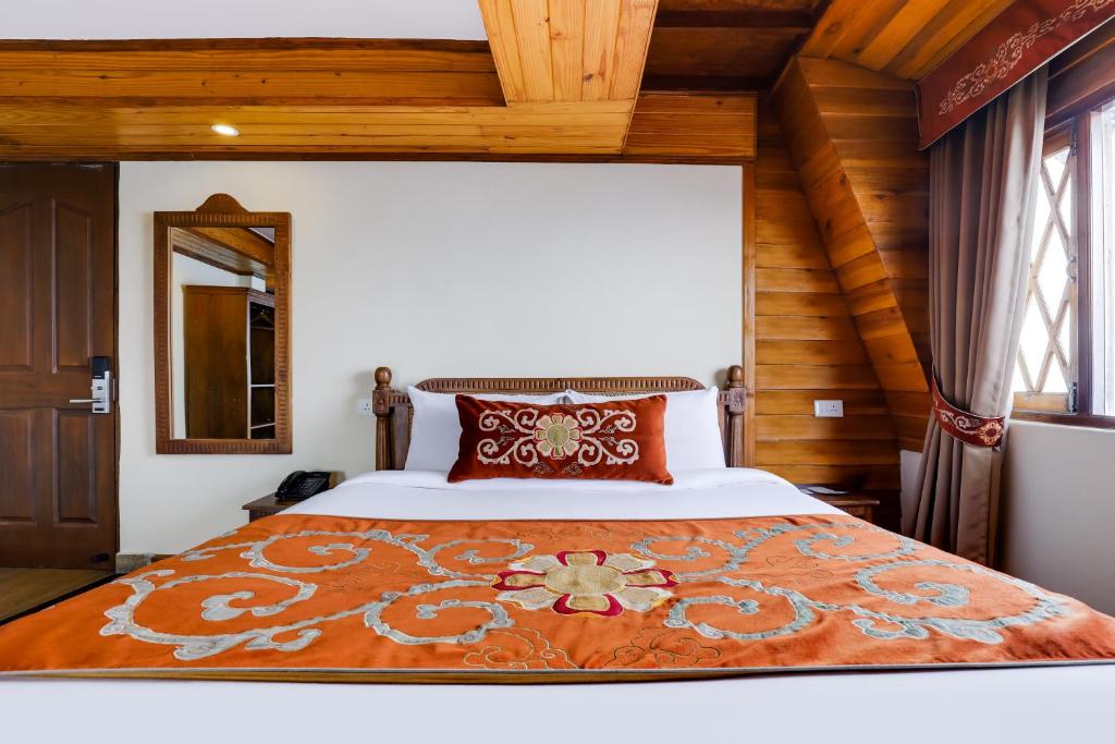 Postel nebo postele na pokoji v ubytování Summit Hermon Hotel & Spa
