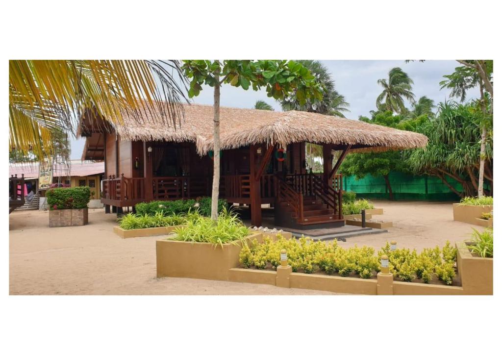 Zahrada ubytování Nilaveli Beach Resort - Level 1 Certified