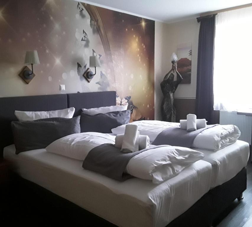 Postel nebo postele na pokoji v ubytování Lieth-Hotel-Grünreich