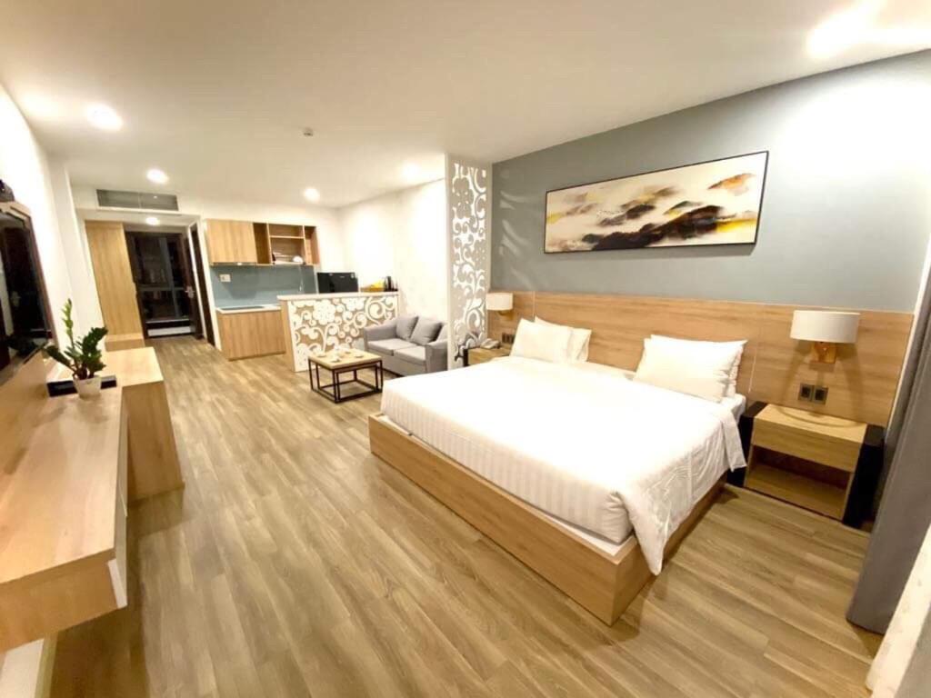 Postel nebo postele na pokoji v ubytování LiLy Apartment