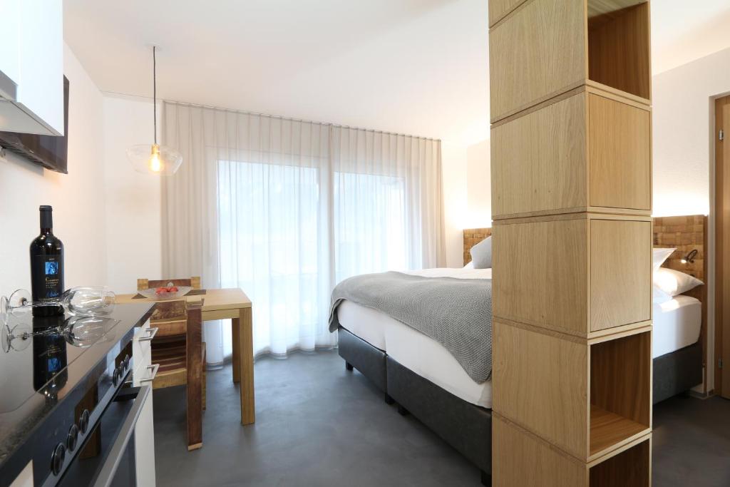 Postel nebo postele na pokoji v ubytování BnB Vino Veritas