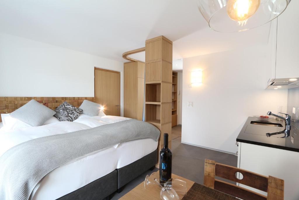 Postel nebo postele na pokoji v ubytování BnB Vino Veritas