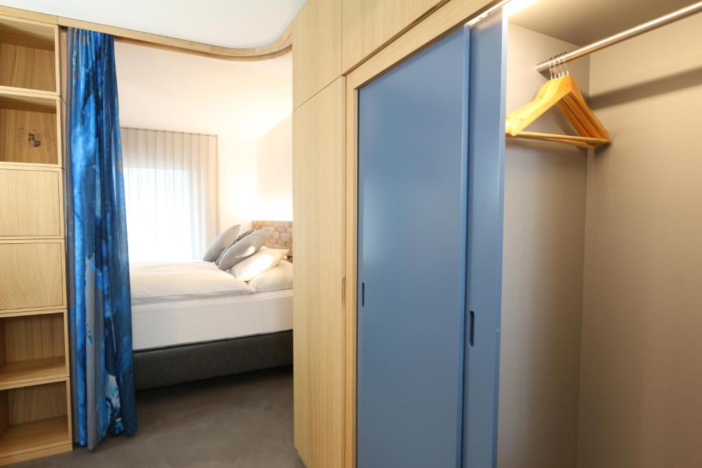 Postel nebo postele na pokoji v ubytování BnB Vino Veritas