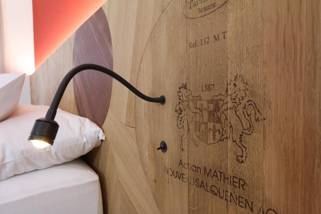 Postel nebo postele na pokoji v ubytování BnB Vino Veritas