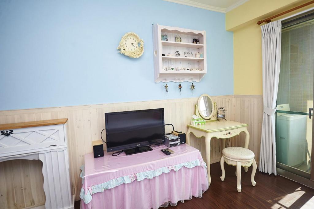 TV a/nebo společenská místnost v ubytování MB Hotel
