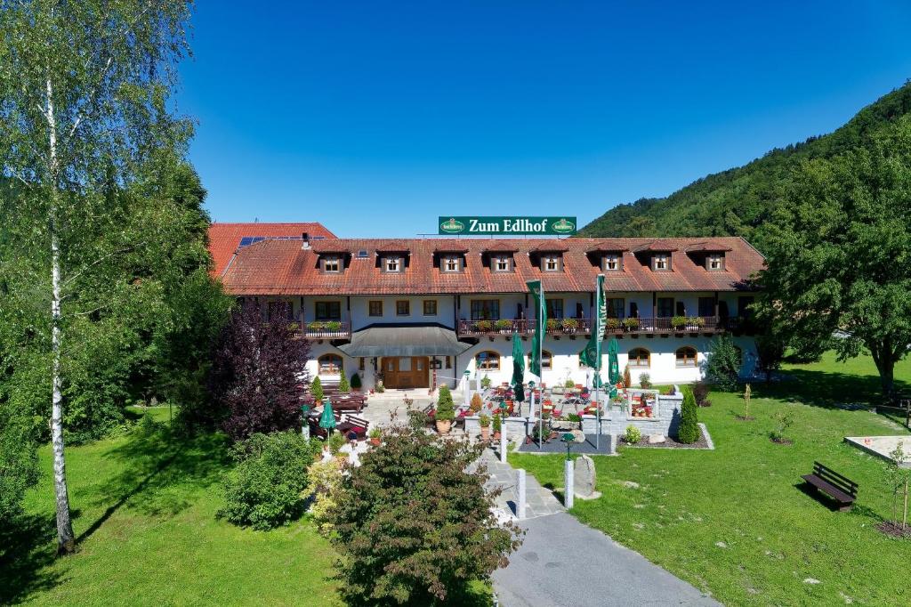 a building with a cemetery in front of it at Zum Edlhof in Obernzell