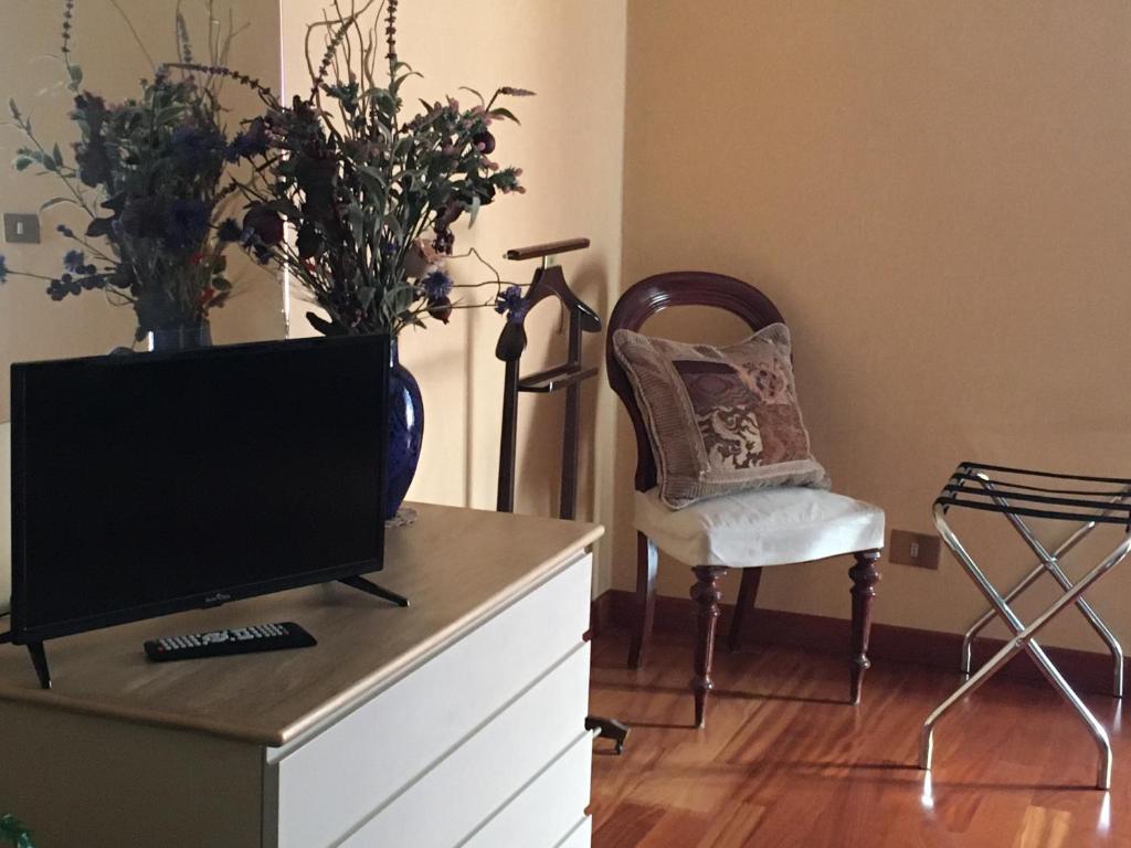 TV a/nebo společenská místnost v ubytování Casa di Lucia B&B