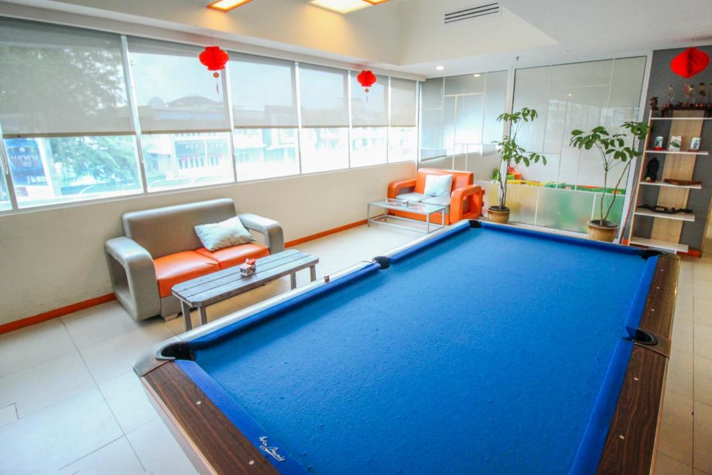 Posezení v ubytování HARRIS Hotel Pontianak
