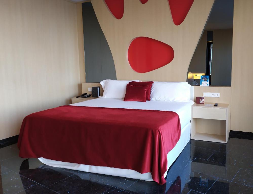 מיטה או מיטות בחדר ב-Hotel Porta Fira 4* Sup