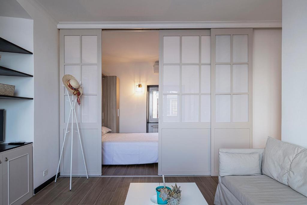 A bed or beds in a room at Sapore di Sale by Wonderful Italy