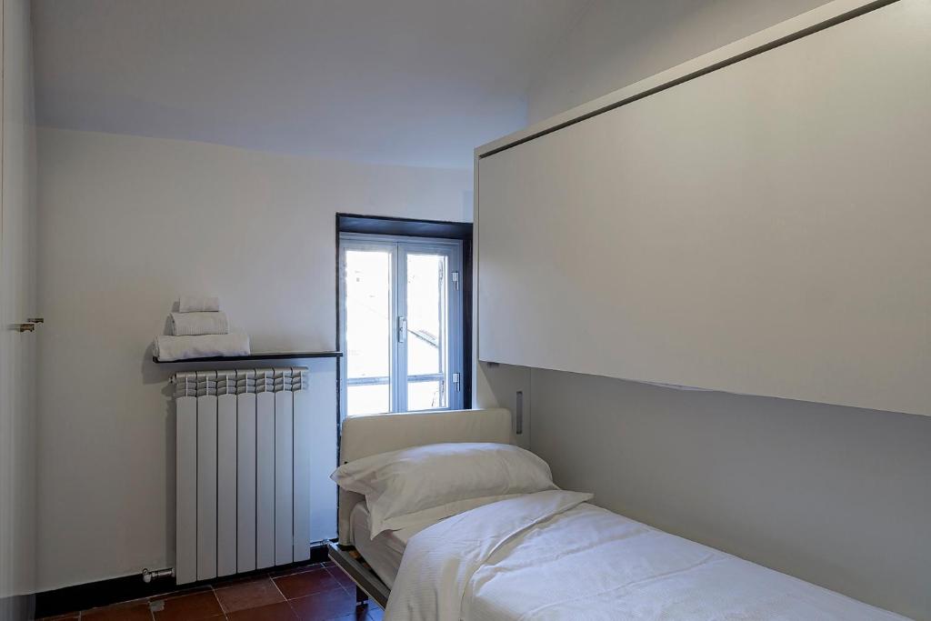 A bed or beds in a room at Sapore di Sale by Wonderful Italy