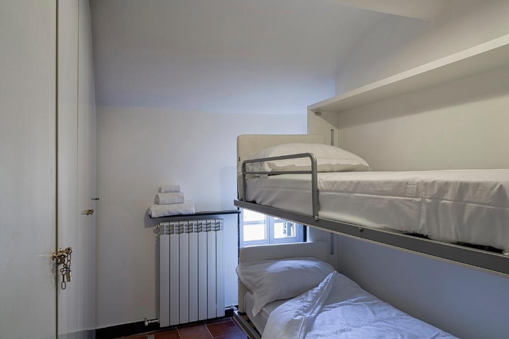 A bed or beds in a room at Sapore di Sale by Wonderful Italy