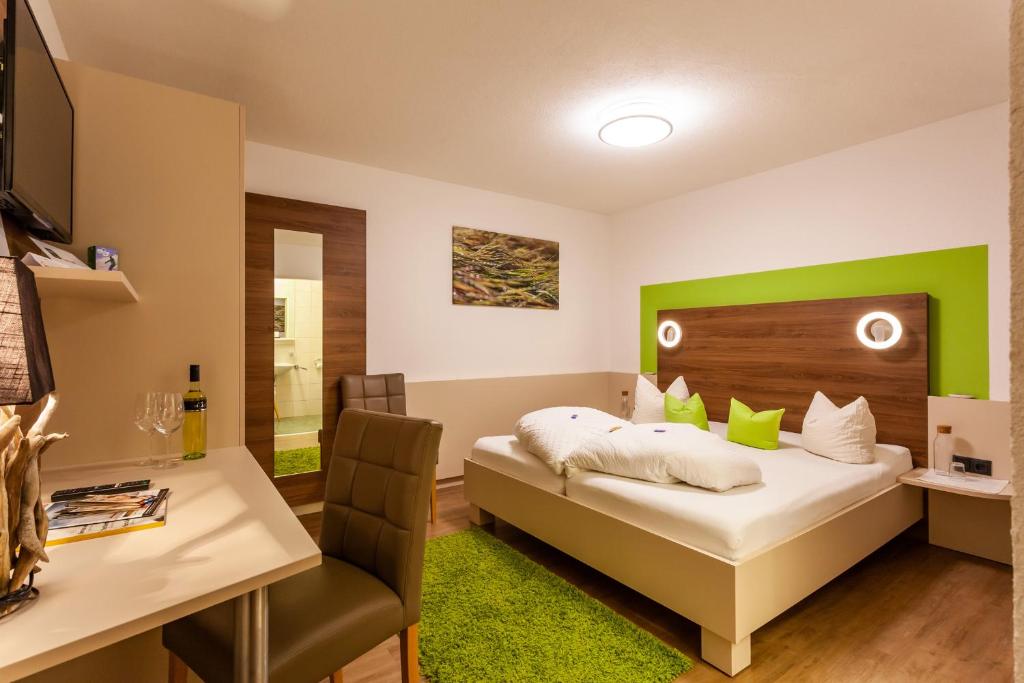 Postel nebo postele na pokoji v ubytování Haus Aktiv