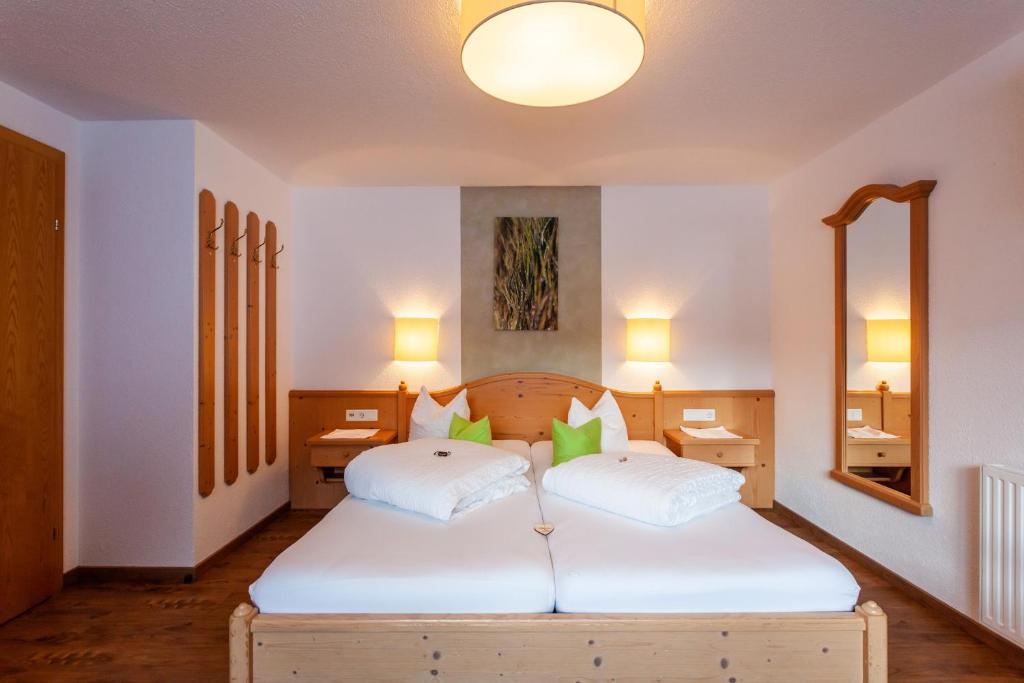 Postel nebo postele na pokoji v ubytování Haus Aktiv